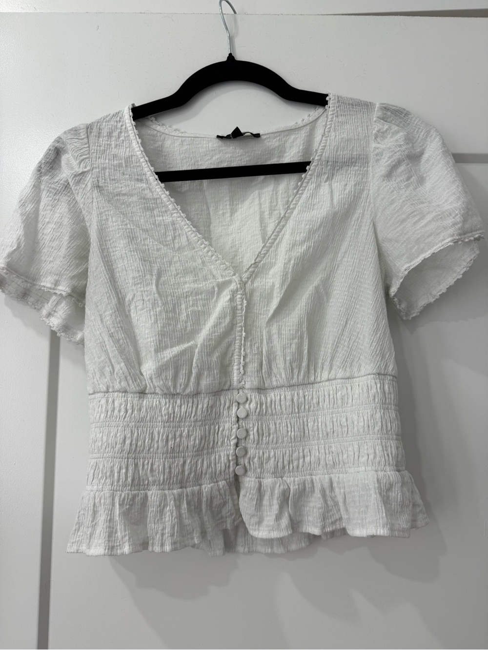PAIGE White V-Neck Smocked Ruffle Hem Blouse